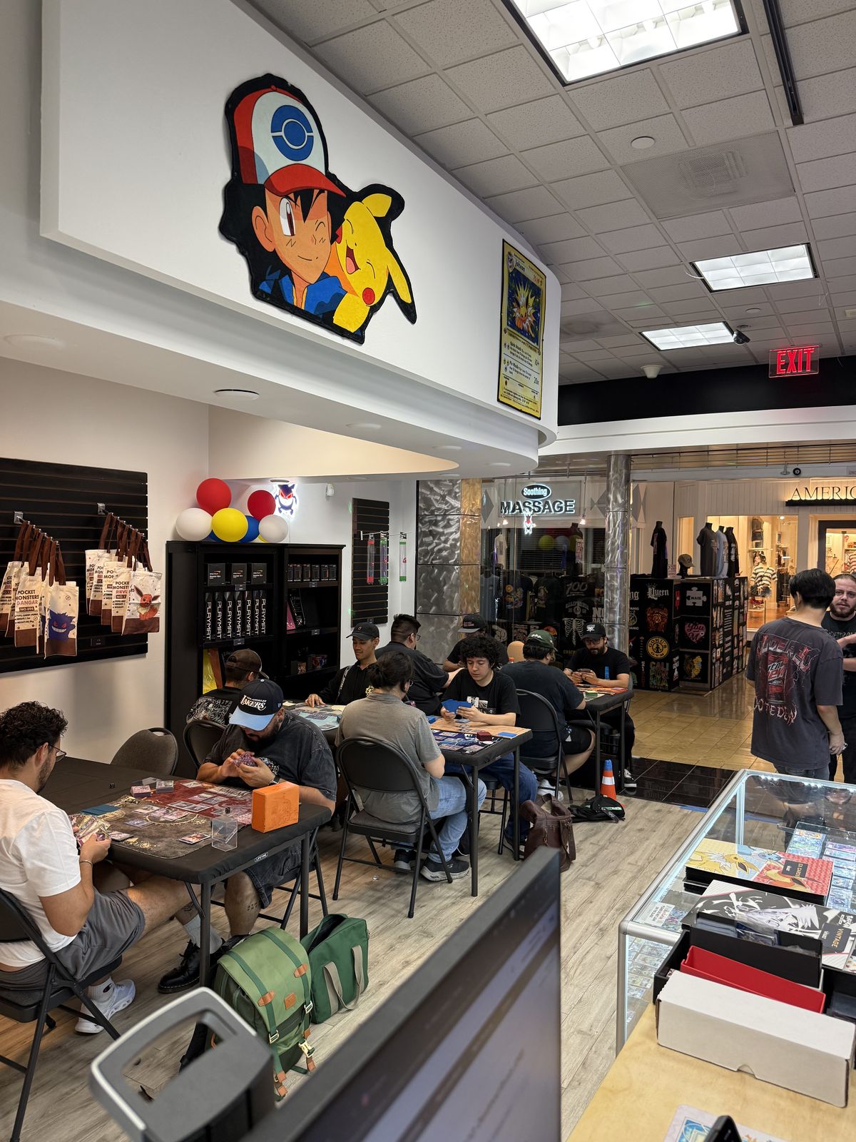 Players competing at a TCG Vault tournament in Palm Desert